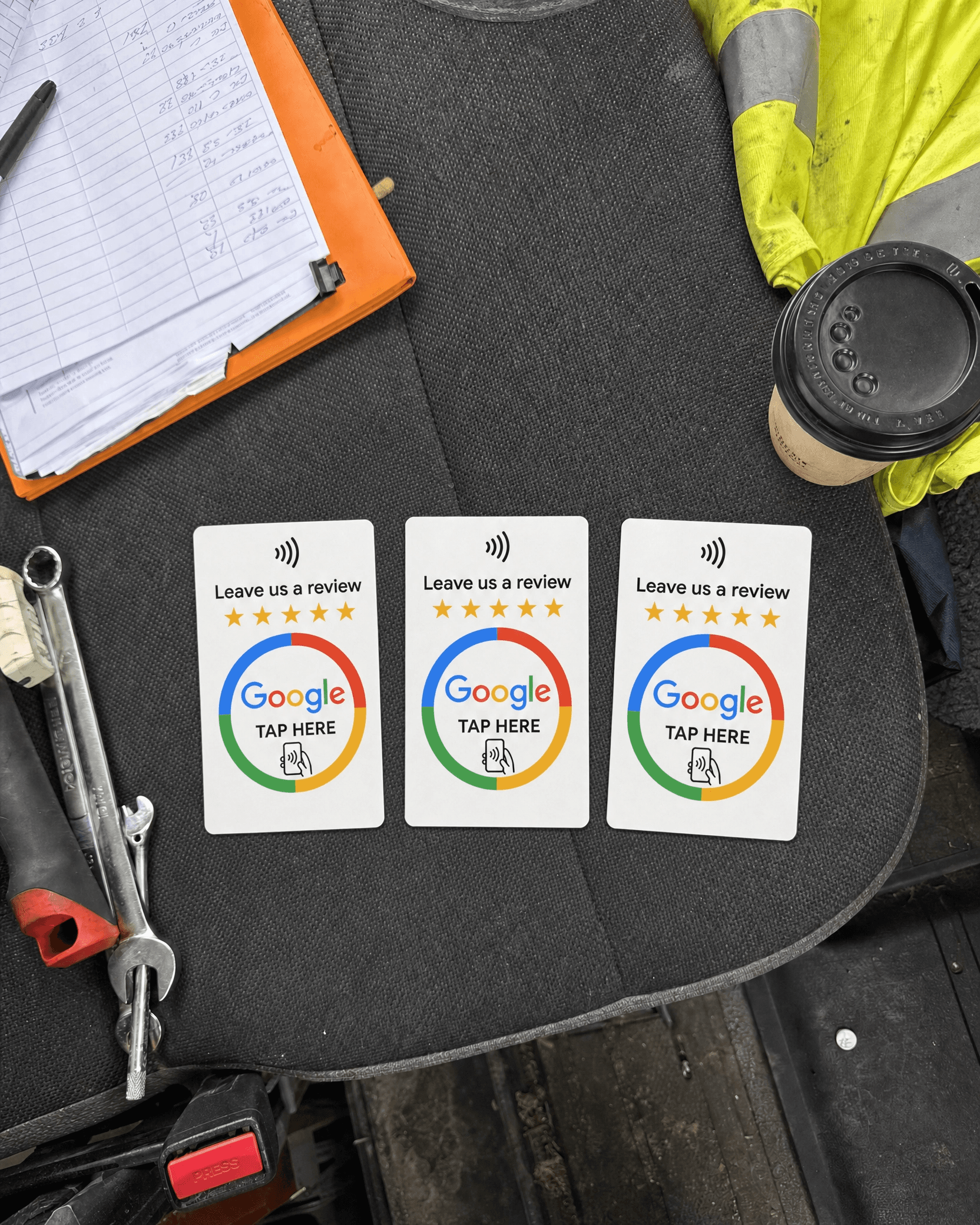 RevuBoost Google review cards in a plumber's van