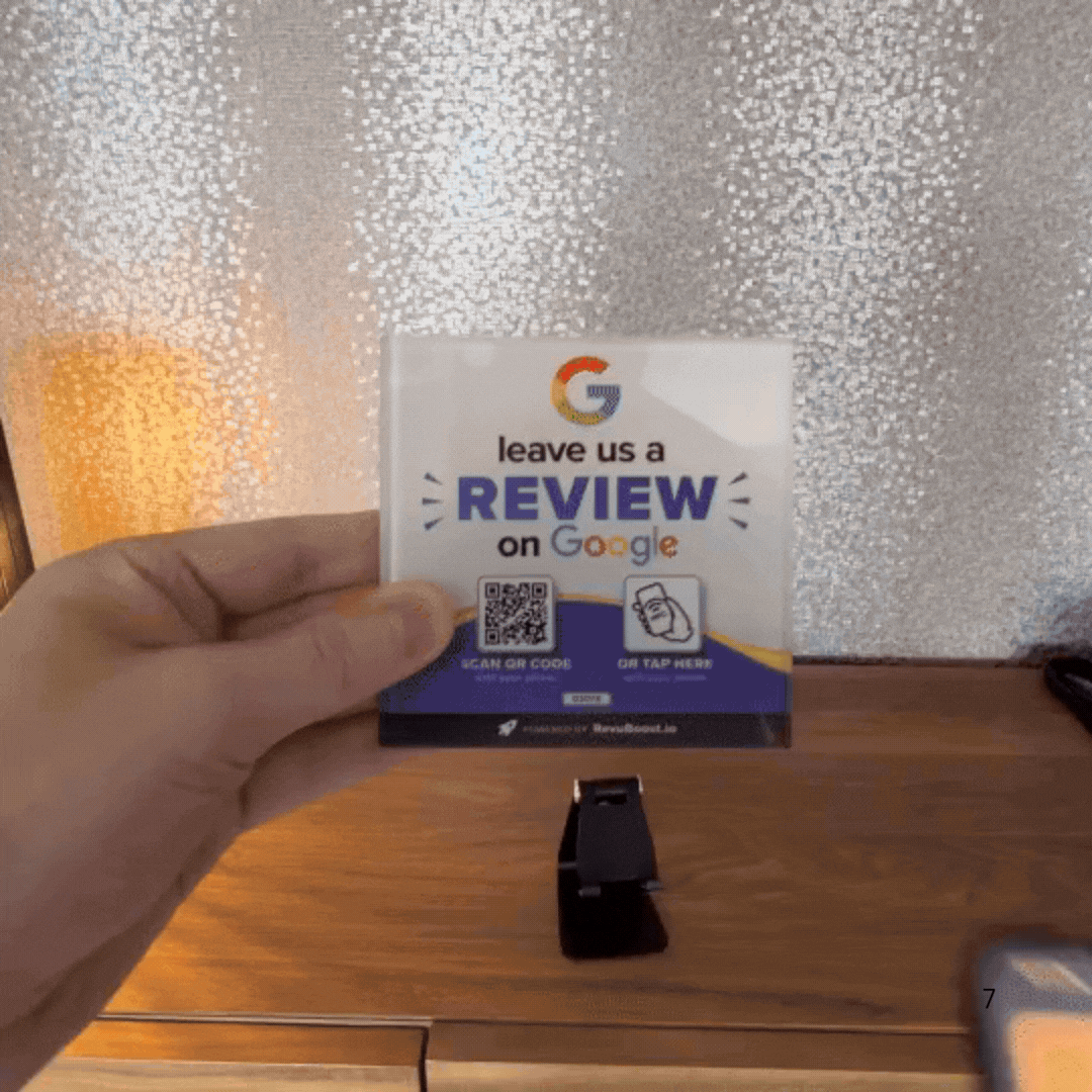 Customer leaving a Google review in seconds by tapping the plate